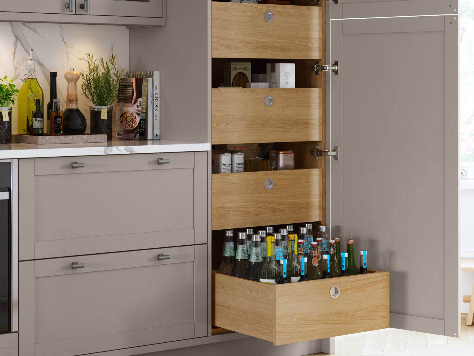 The larder unit with kitchen unit pull-out storage drawers