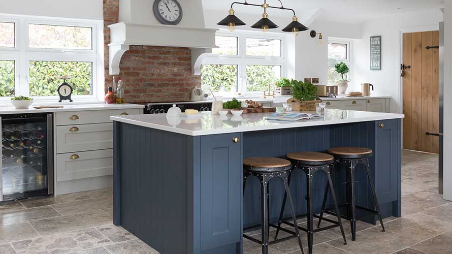Shaker kitchen featuring dark blue kitchen island