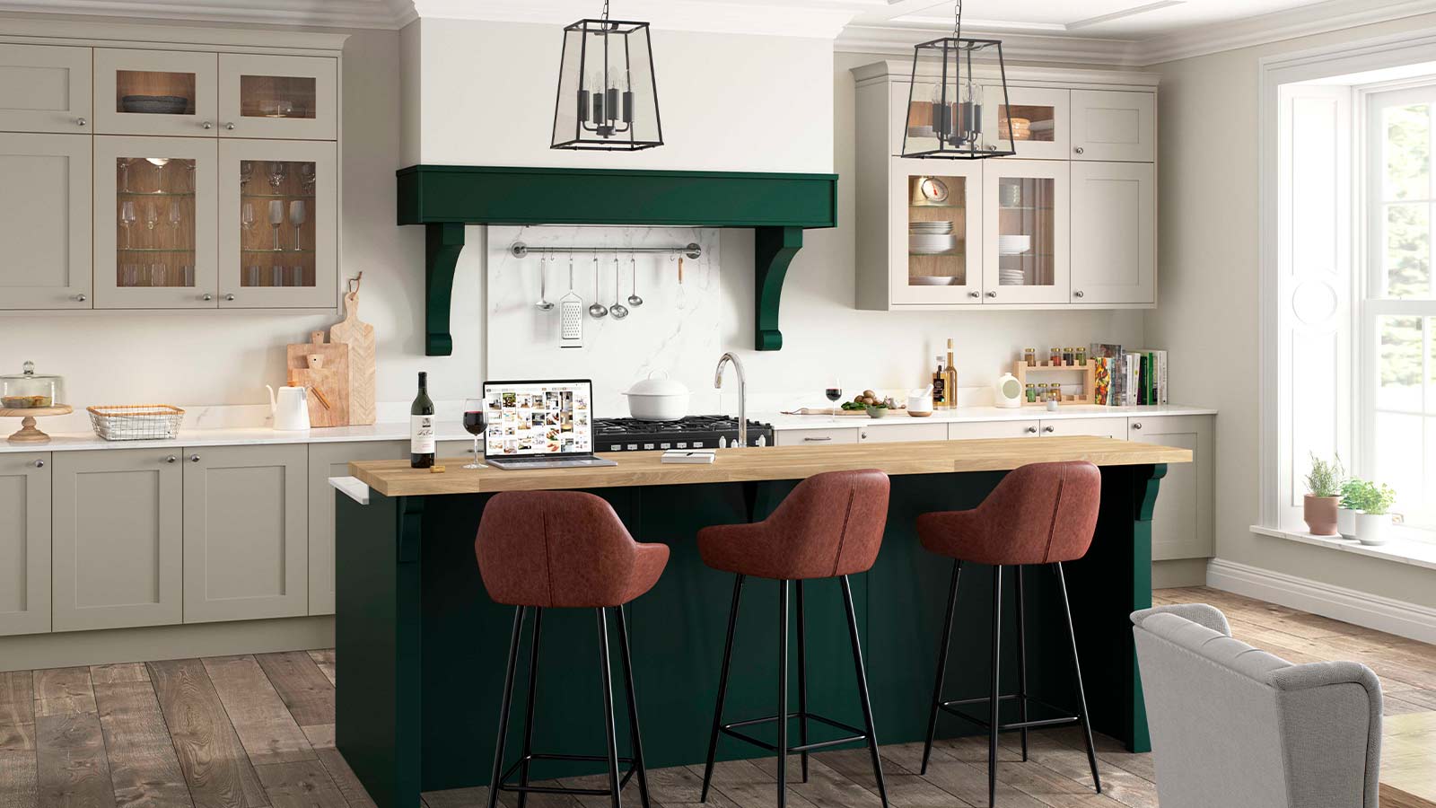 A grey shaker kitchen featuring green kitchen island