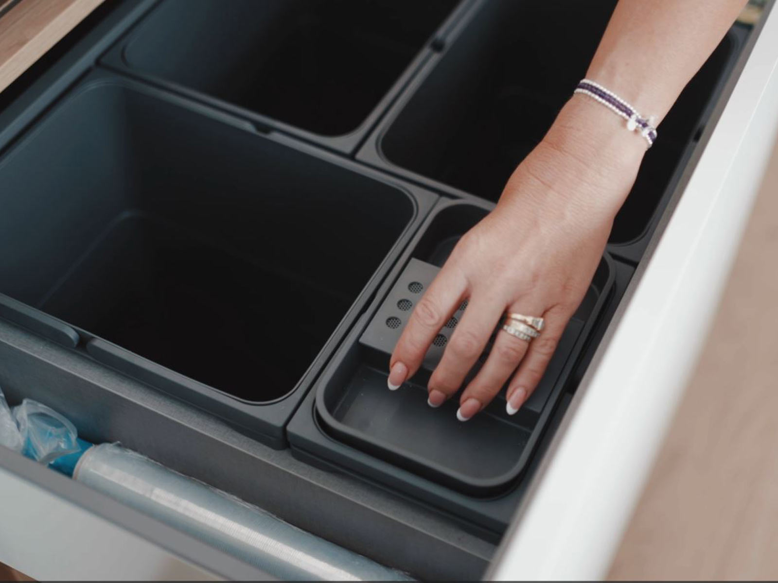 Integrated kitchen bin for recycling and food storage containers