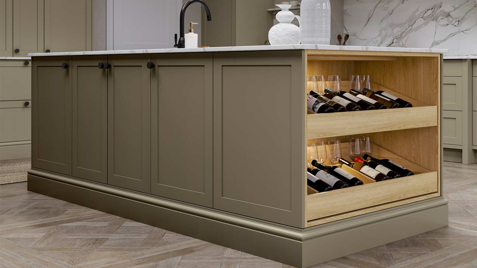 A kitchen island with a shelf for wine bottles