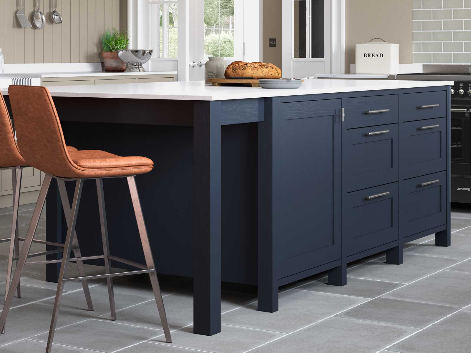 A small kitchen island with seating in the form of island barstools