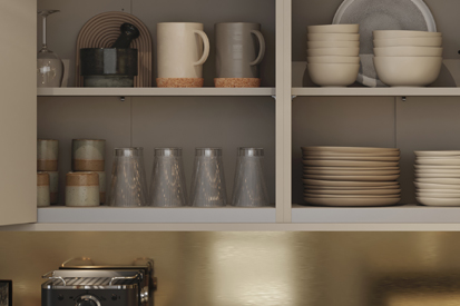 Crockery in a kitchen wall cabinet