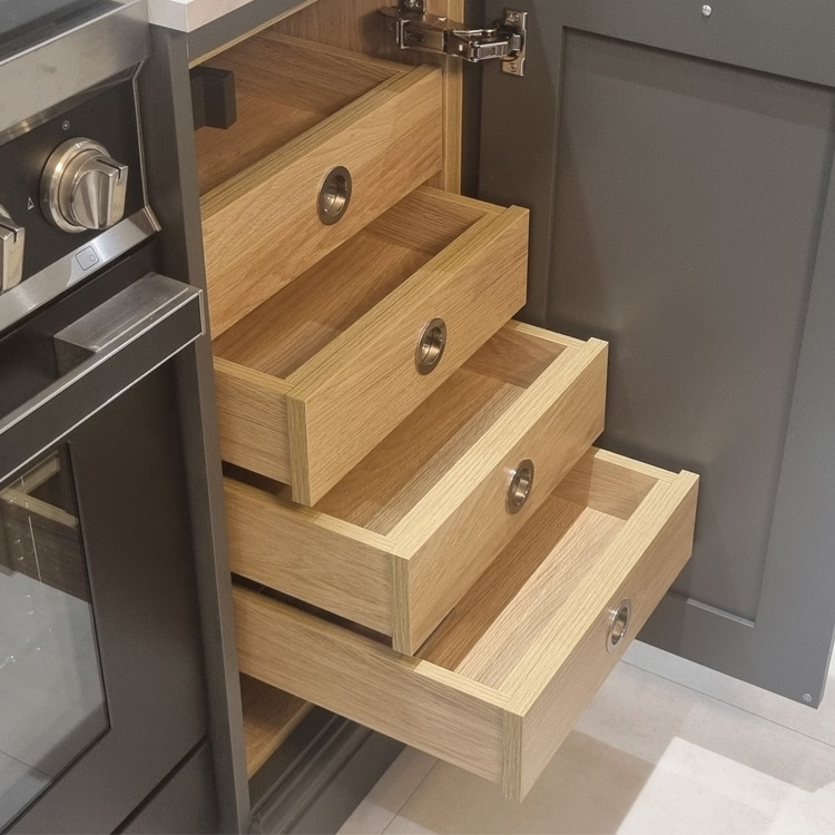 Internal drawers behind a kitchen cabinet door