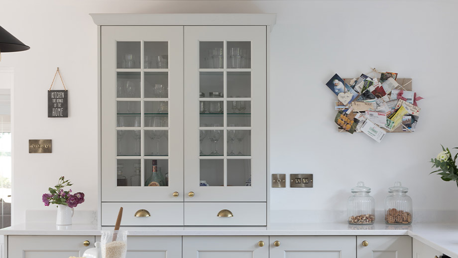 Kitchen cabinets with glass doors in an elegant shaker kitchen