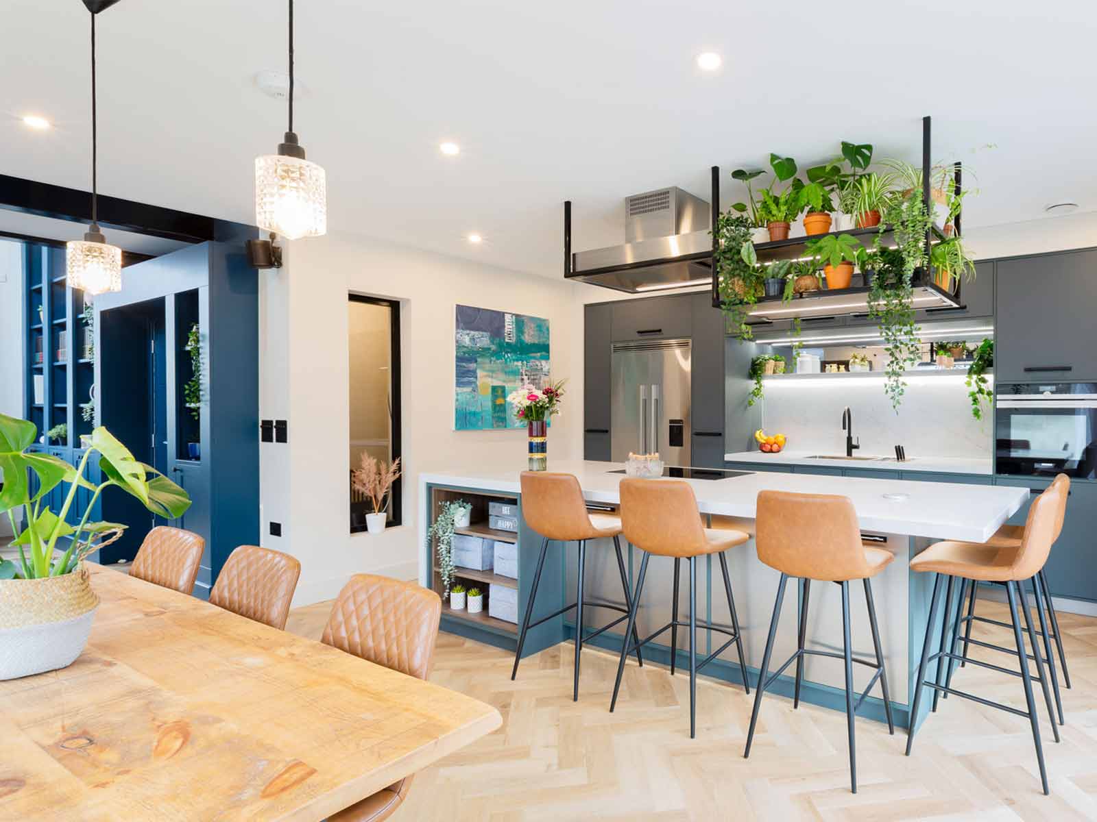 A natural-light-flooded kitchen that follows biophilic theory design principles
