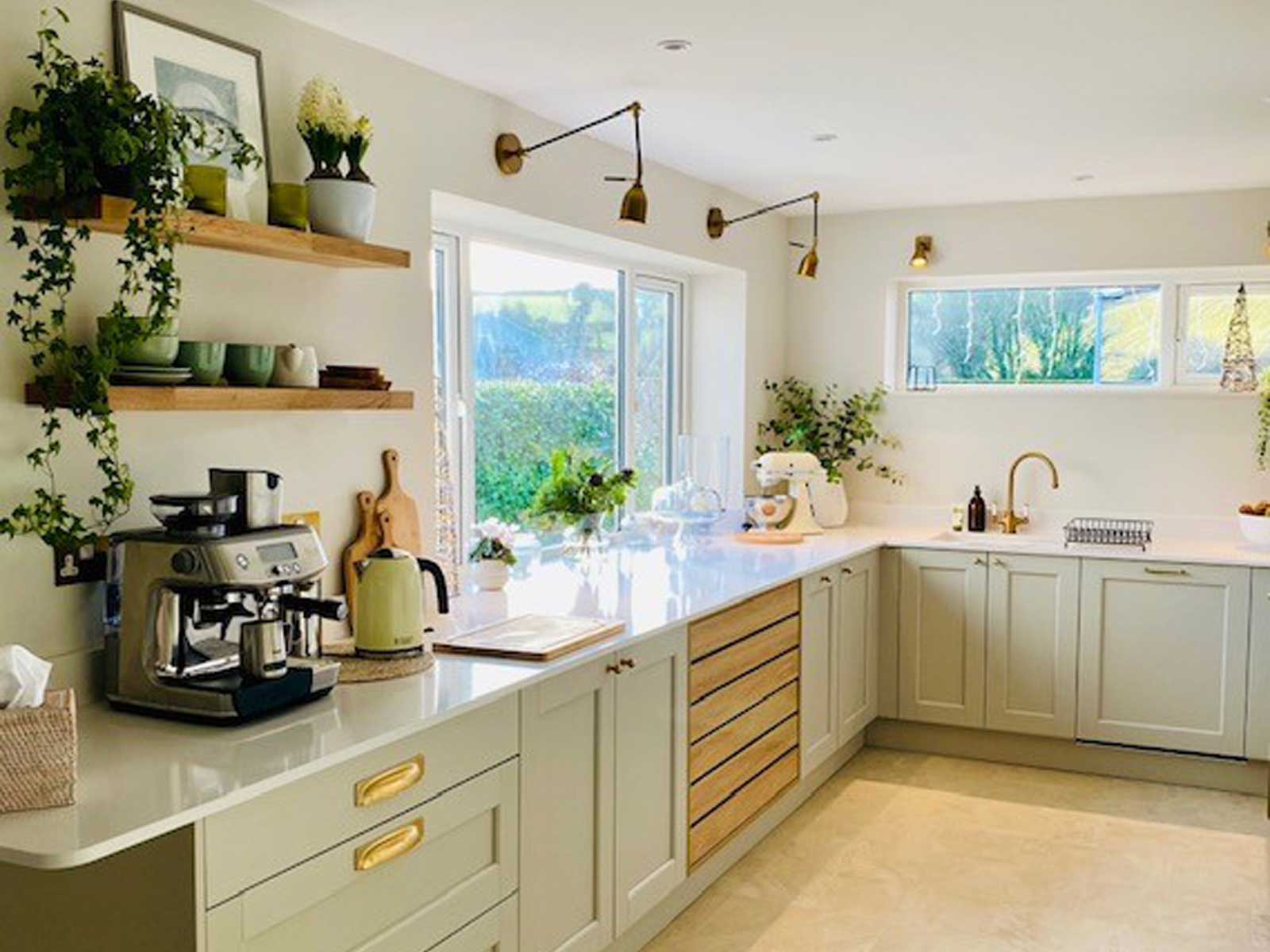 A biophilic design natural kitchen with natural stone countertops