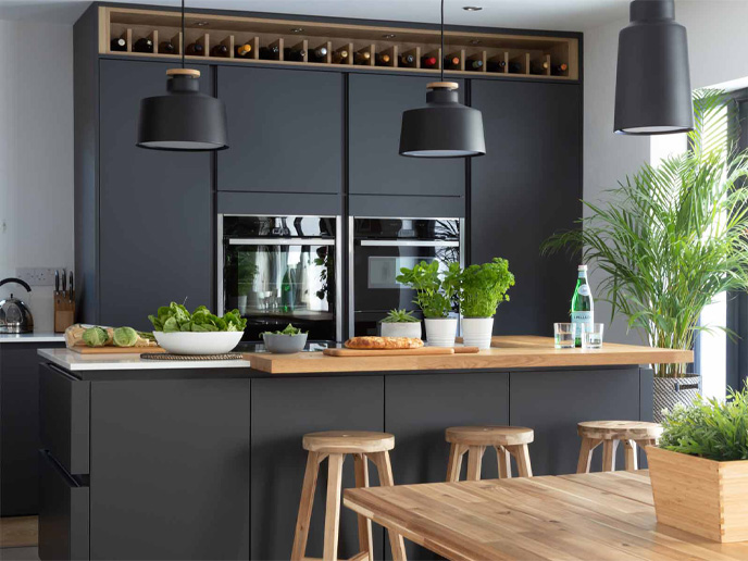 Biophilic kitchen design utilising air purifying plants and tall house plants