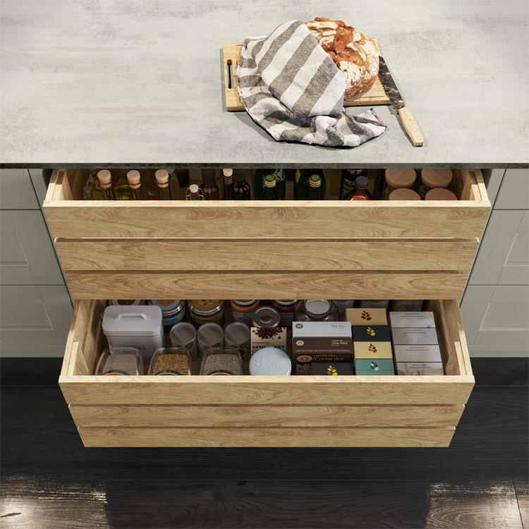 Open oak crate drawers containing food supplies