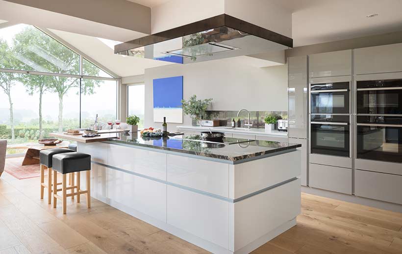 A modern kitchen with large kitchen island
