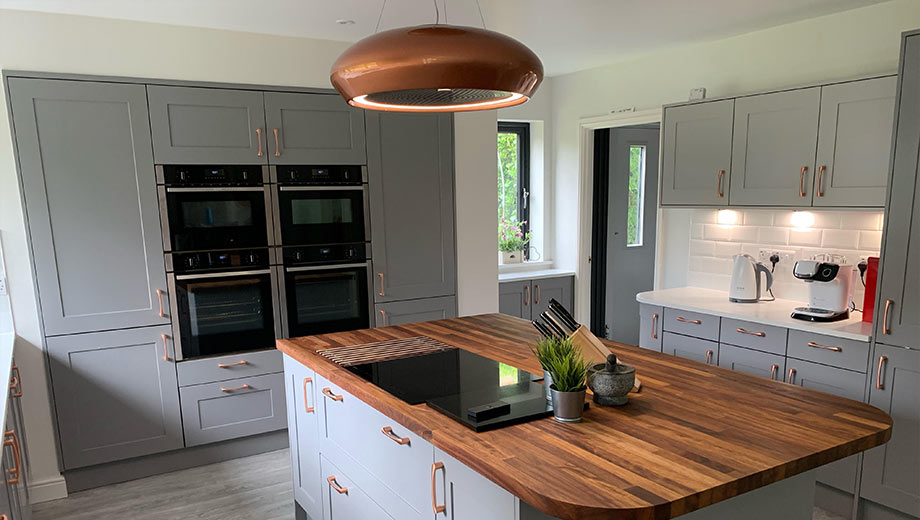Grey shaker kitchen with copper handles