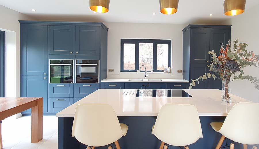 Classic blue kitchen with blue kitchen island