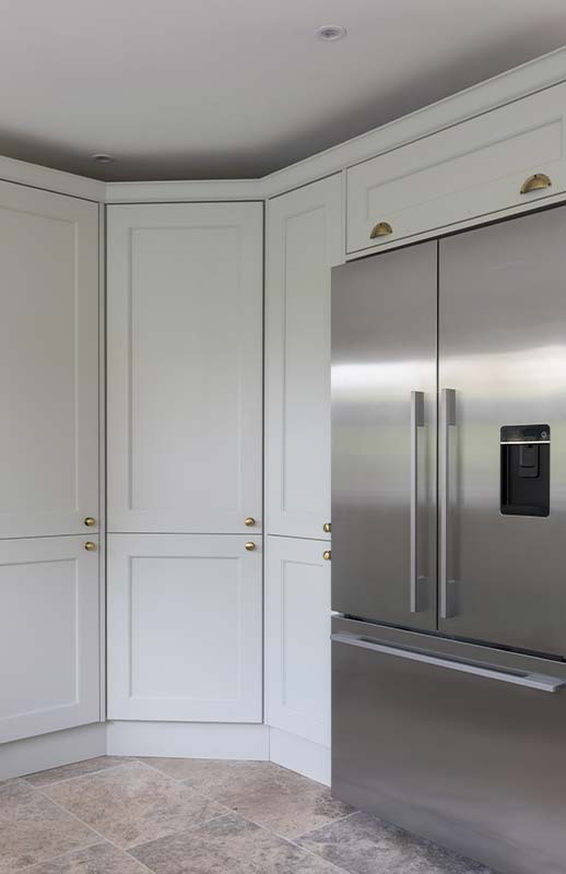 Corner pantry storage in a classic kitchen