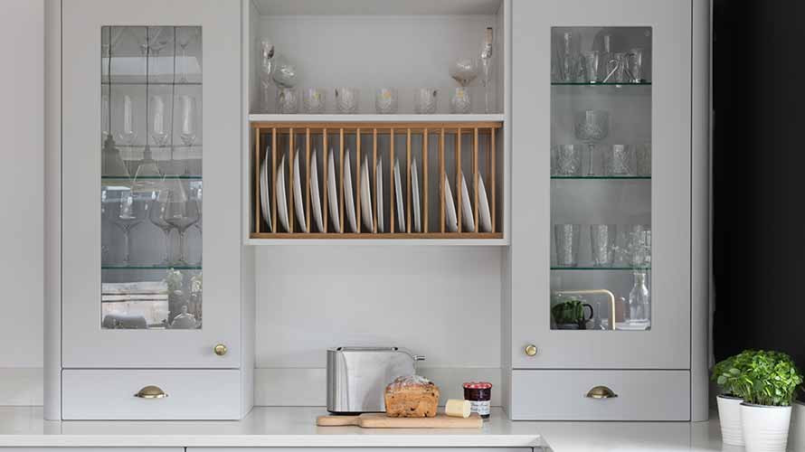 Classic kitchen storage featuring wood plate racks