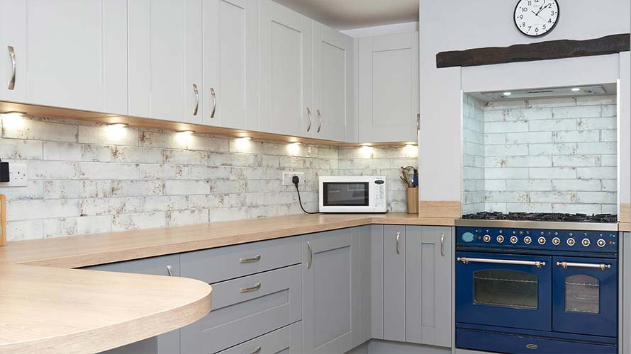 Spot lighting in a grey shaker kitchen