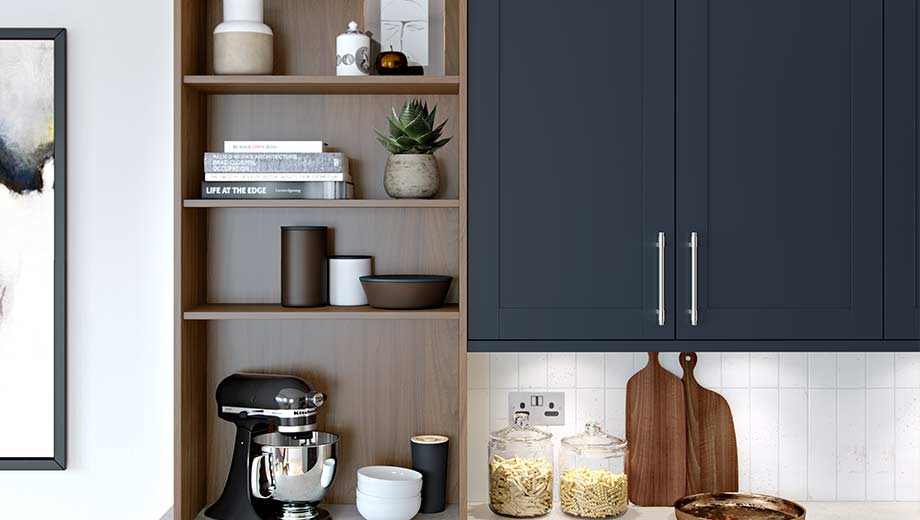 Navy kitchen cabinets with wood effect shelving