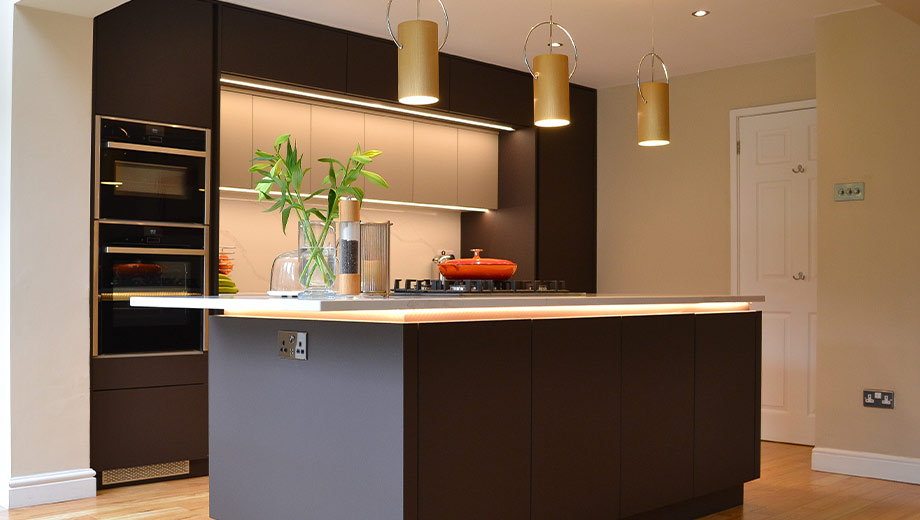 Dark brown modern kitchen with island