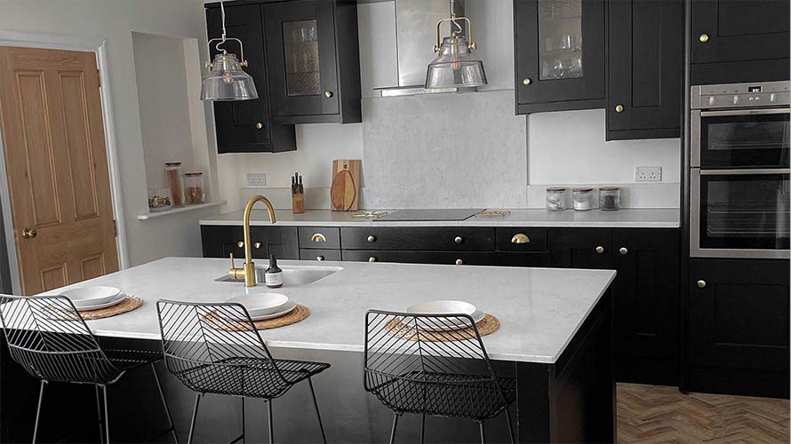 Stunning dark kitchen with shaker style doors and gold handles