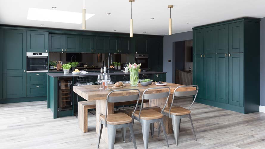 Green shaker kitchen with kitchen island