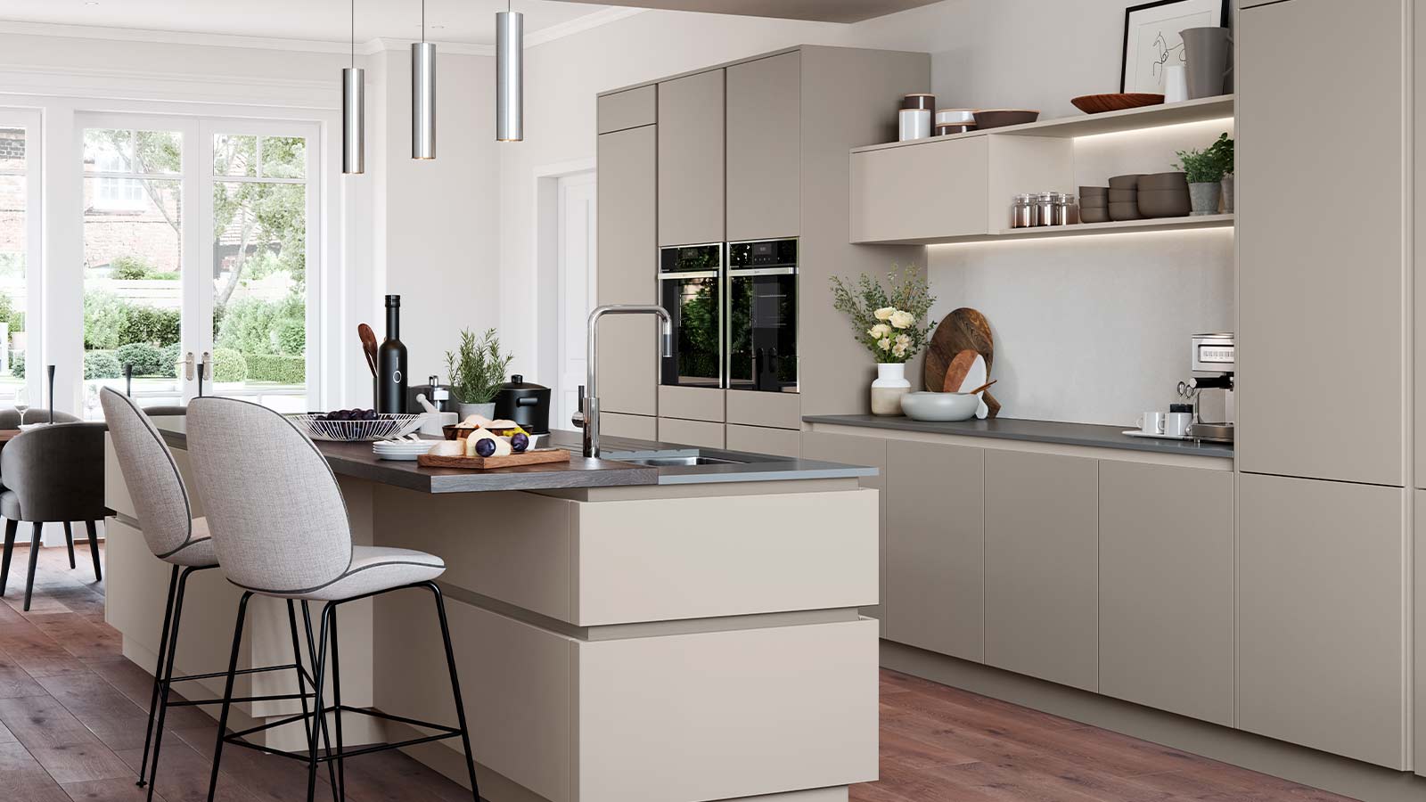 A modern handleless kitchen in grey