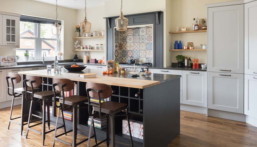 Grey shaker kitchen featuring tiled splashback and open shelving