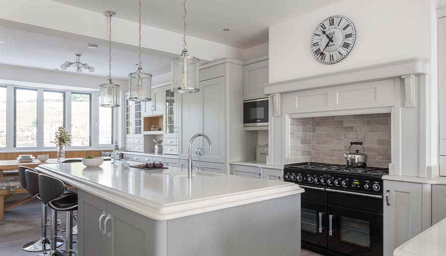 Classic grey shaker kitchen with kitchen island and bench seating