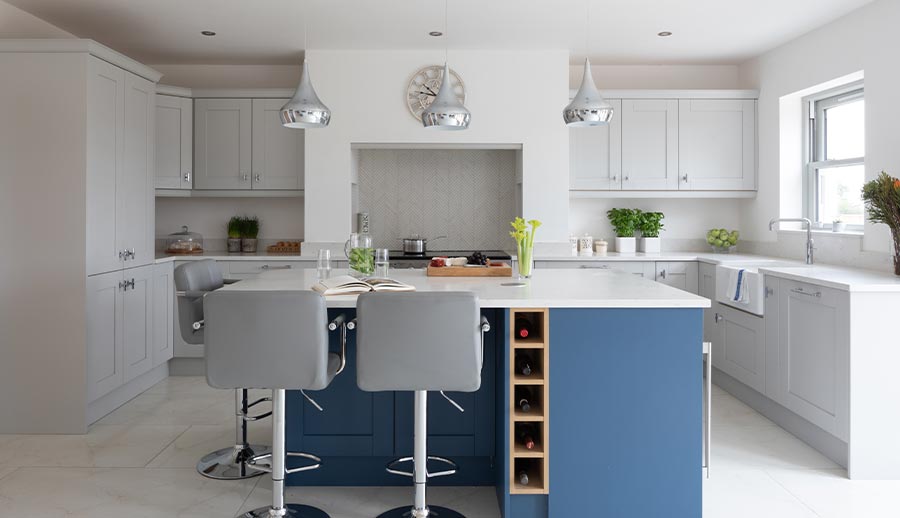 Contemporary grey shaker kitchen featuring blue kitchen island
