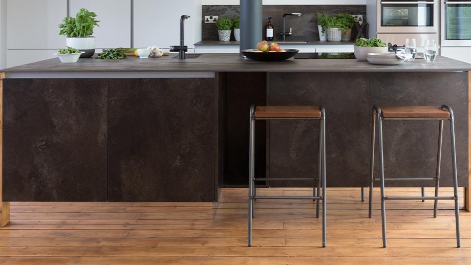 Industrial kitchen island with stone effect doors