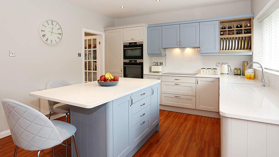 Blue and grey shaker kitchen with island