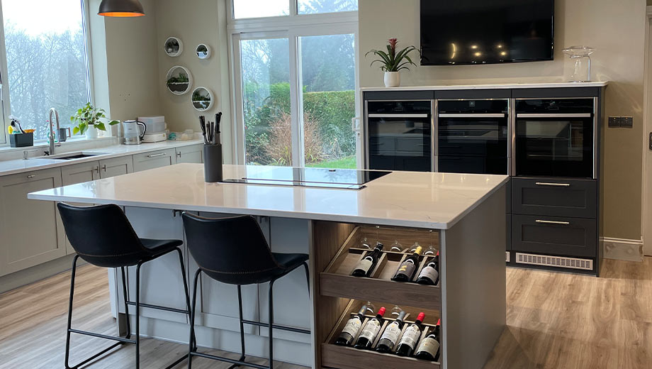 Kitchen island with seating and wine drawers