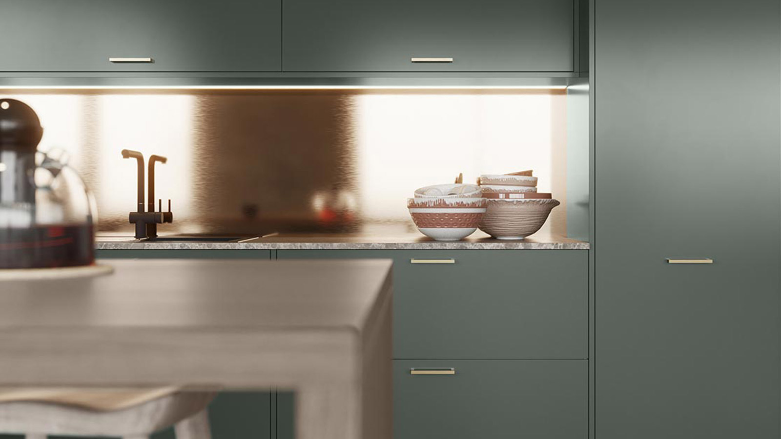 A Sutton Heather kitchen range with t-bar handles and a bronze backsplash