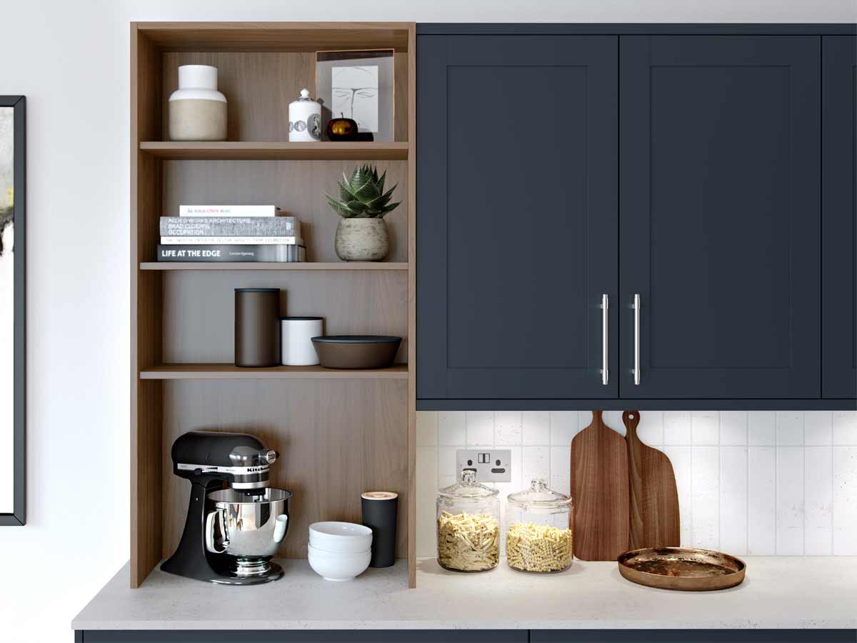 Modern navy kitchen cabinets with stainless steel knurled handles