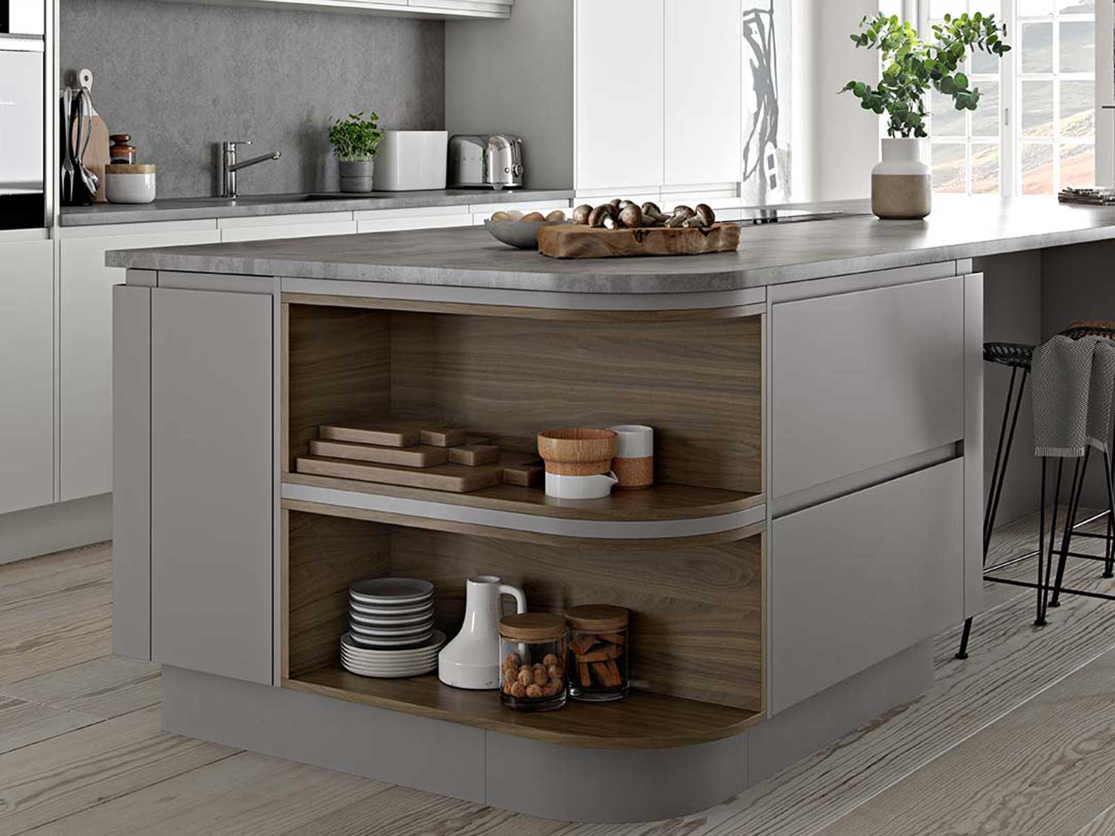 Open shelving with dark wood finish set in a handleless kitchen island