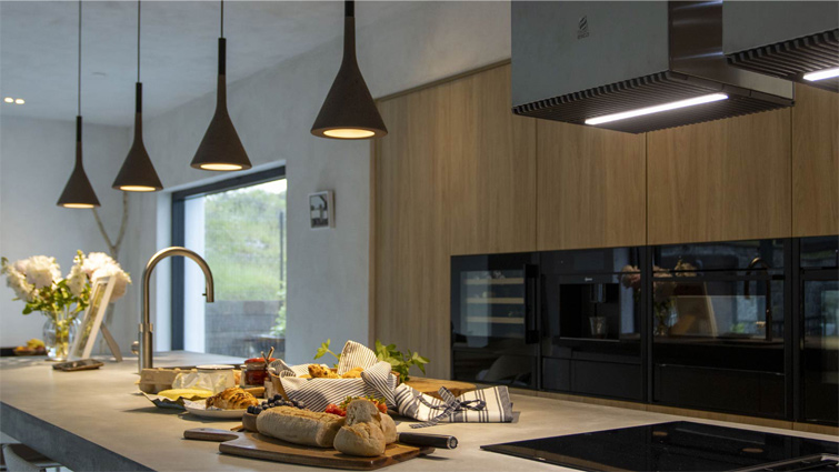 A modern desert interior featuring an island and desert modern interior design