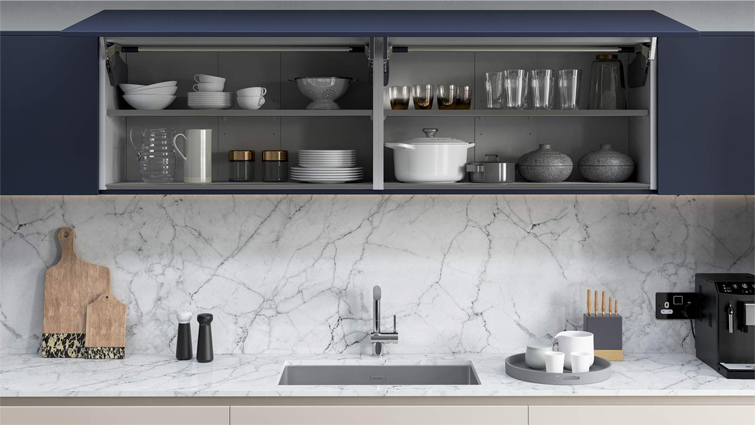 A desert modernism kitchen setup featuring extra-wide kitchen wall cabinets