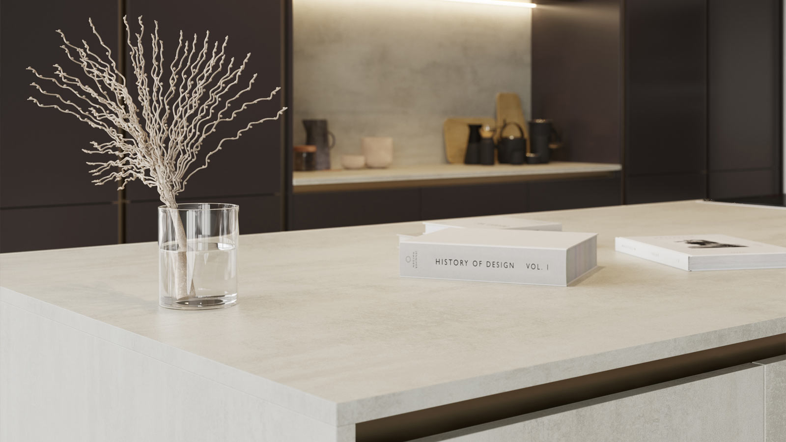 A minimalist, handleless white stone-effect freestanding kitchen island