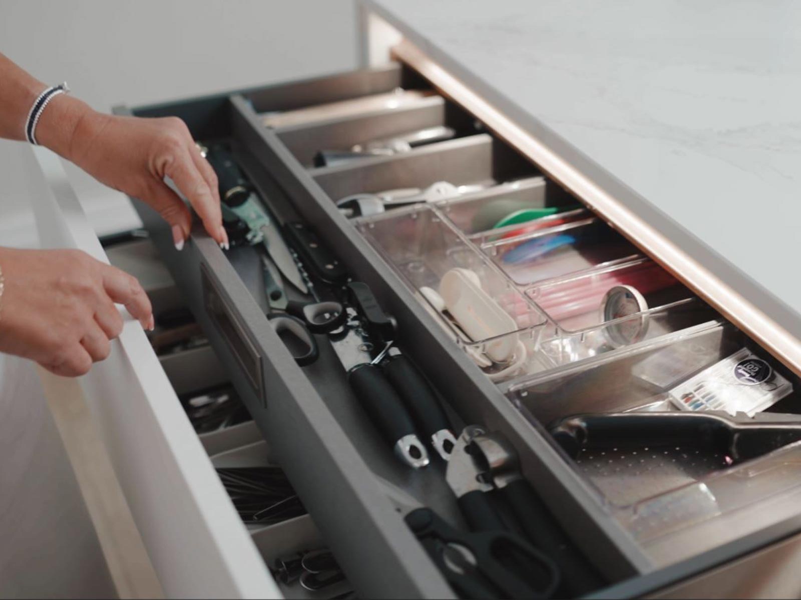 White handleless kitchen drawers with internal drawers for kitchen organisation