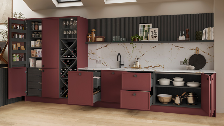 Fully coordinated kitchen cabinet internals shown in a red kitchen