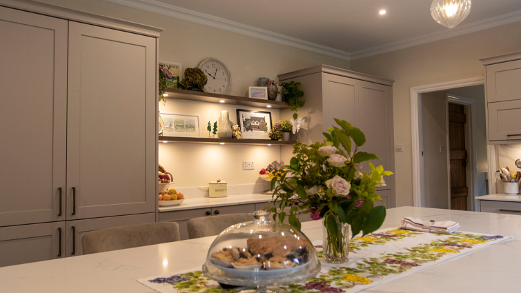 A mushroom kitchen with a kitchen island and warm lighting