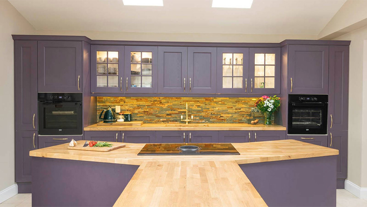 A purple kitchen with vibrant kitchen paint colours