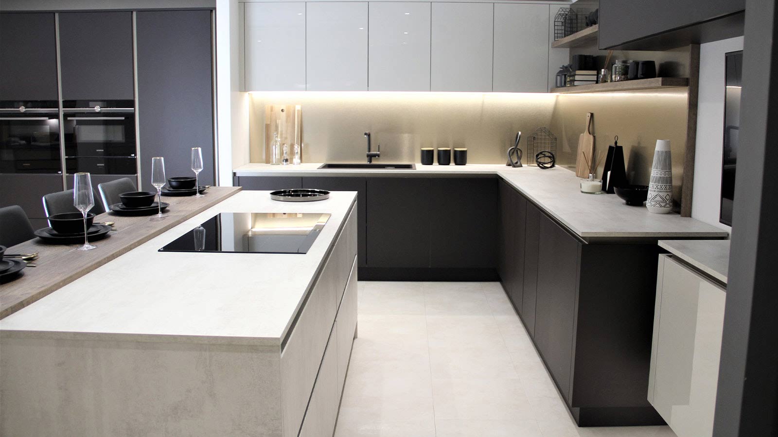 Two tone modern luxury kitchen with marble kitchen worktops