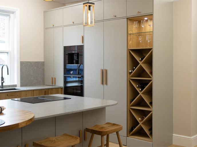 A modern white kitchen design with a contemporary minimalist kitchen wine rack