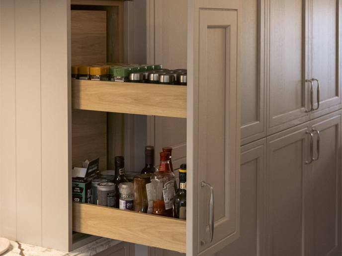 A mushroom colour kitchen larder unit