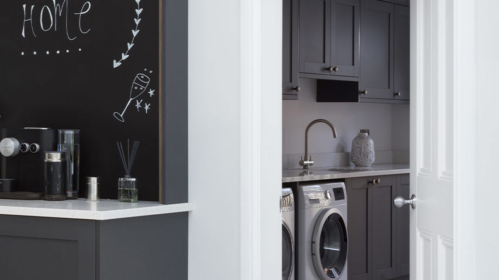 Utility room with shaker kitchen cabinets in grey