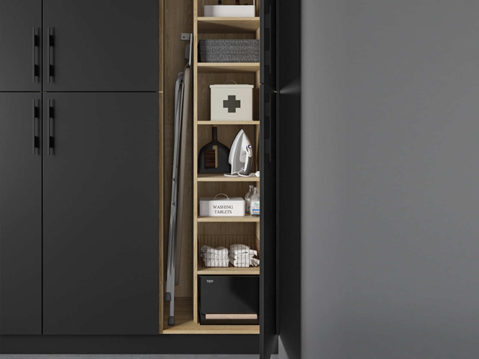Laundry room cabinet with black doors and wooden shelves