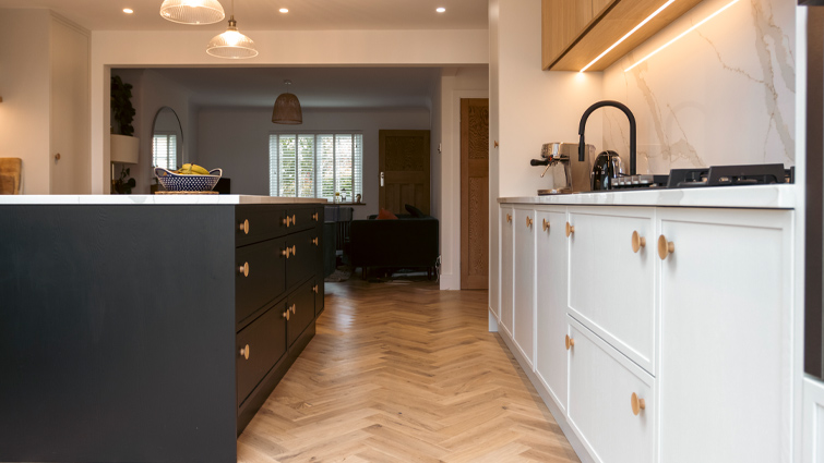 Modern Shaker kitchen island showing the gap needed around an island for obstructions