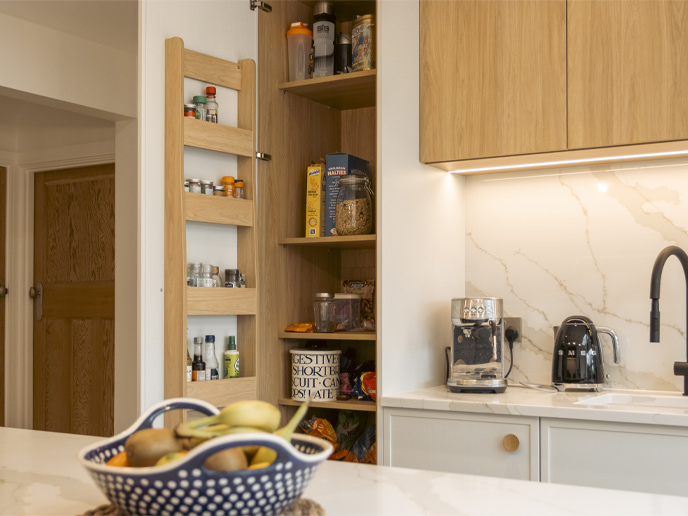 A spice holder for cabinet doors used as an organiser for spices in a cupboard