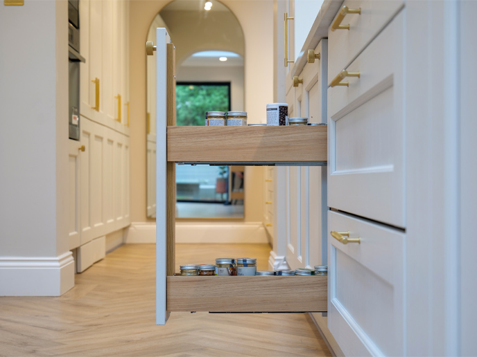 A pull-out seasoning organiser for space-saving spice storage