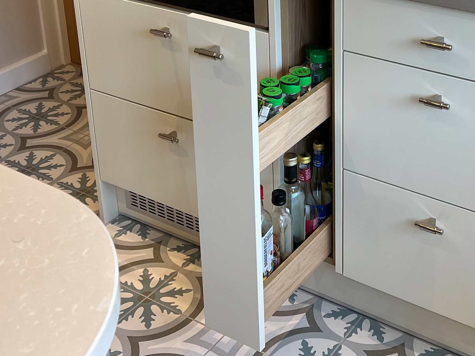 Pull-out pantry unit in a modern kitchen