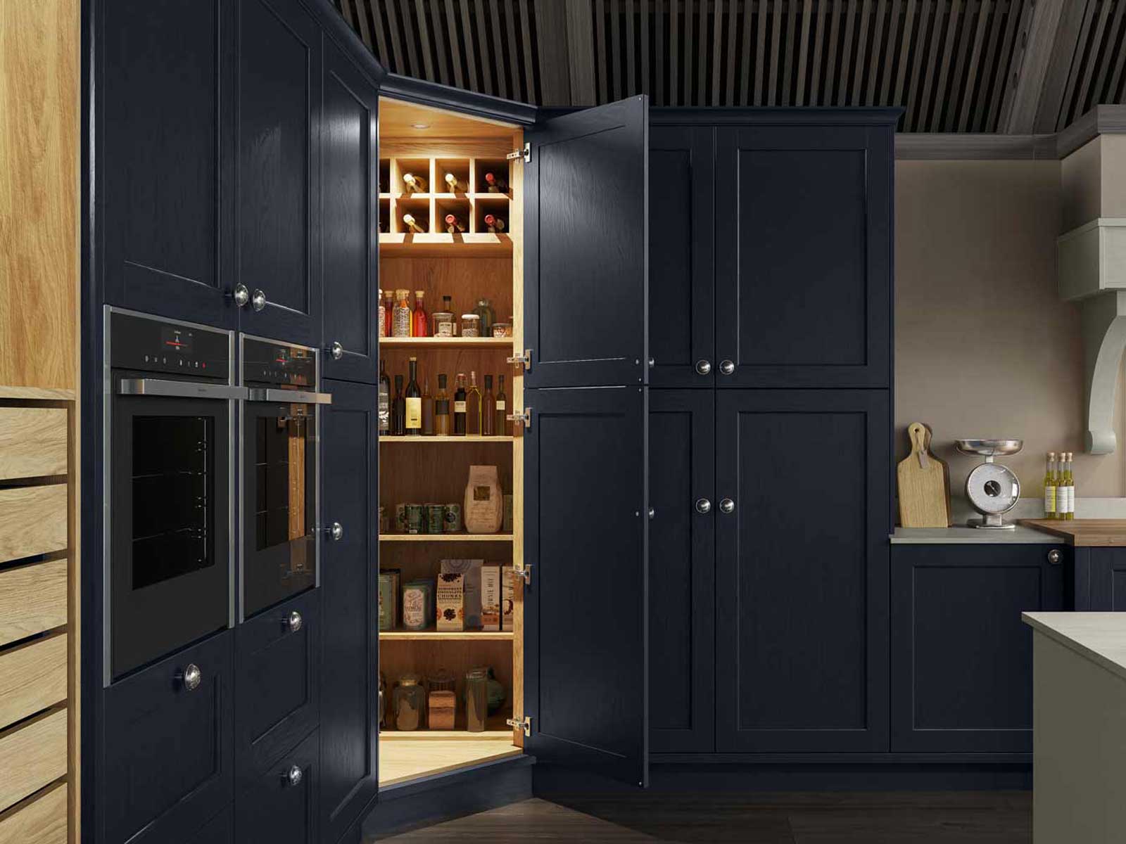 A walk-in kitchen pantry demonstrating excellent blue kitchen cabinet ideas